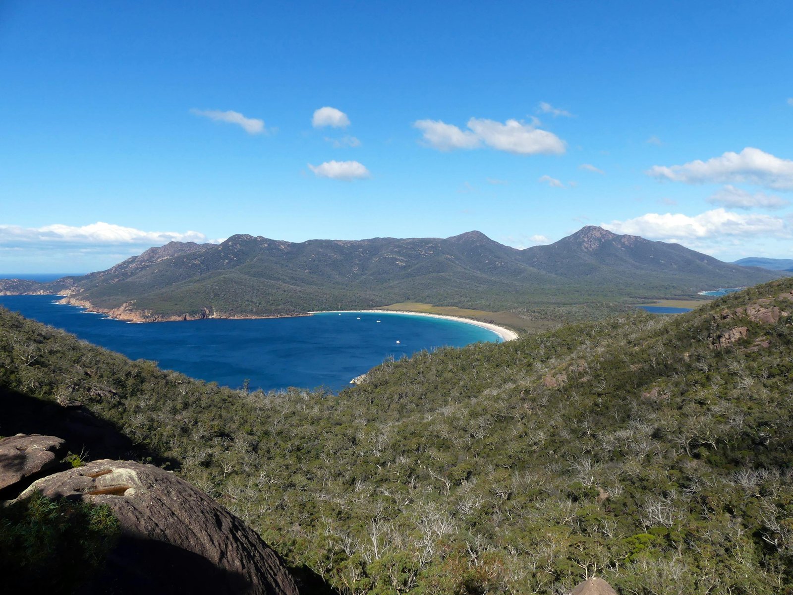 Stunning aerial view of Coles Bay and Wineglass Bay, Tasmania, showcasing natural beauty and landscapes.